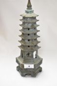 An antique bronze cast censor in the form of a Chinese pagoda, possibly early 18th century. 30cm