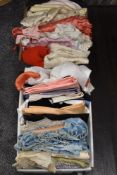 Two boxes of assorted textile fabrics and cloths