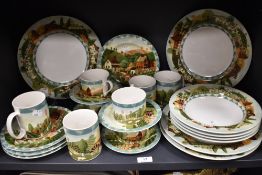 A modern Interiors Country Life pattern part tea and dinner service
