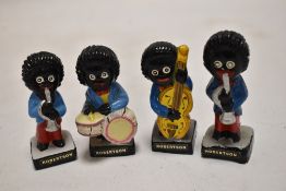 A vintage Robertson jam advertising figure band