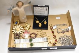 A selection of costume jewellery including bracelets, a Leaves of Gold necklace and earring set