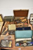 A large collection of work shop joinery and engineering tools including chisels, tap sets, marking