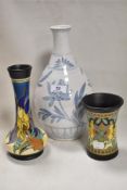 Two 20th century pieces of Gouda pottery from Holland with a blue and white pattern vase.
