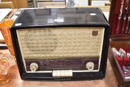 An early 20th century Phillips MK40043 radio set in bakelite case.