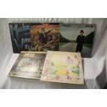 A lot of four Elton John albums