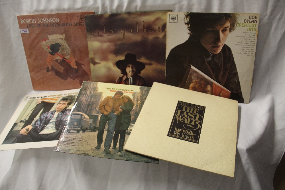 A lot of six folk, blues and rock albums from Dylan, The Band, Arlo Guthrie and Robert Johnson