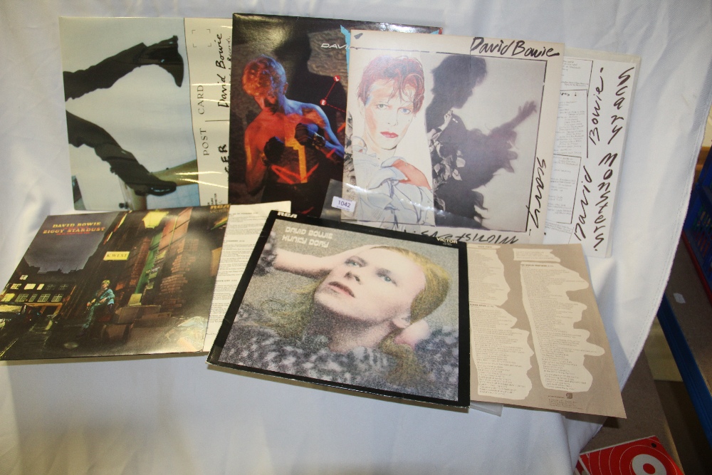 A lot of five Bowie albums with relevant inners. UK pressings that are getting sought after