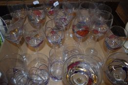 22 matching patterned drinking glasses including large and small wine, champagne, highball and