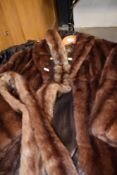 A vintage animal skin jacket, with some deterioration, sold together with a vintage mink or