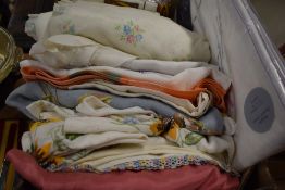 A box of vintage and modern table linen, a vintage baby gown and pram or cot set and a 1930s bed