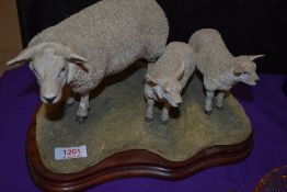 A Border Fine Arts figure study Texel Ewe and Lambs BO658 A/F