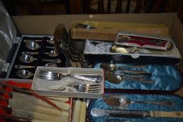 A selection of flatware including six cased teaspoons, six butter knives and and a pretty cased