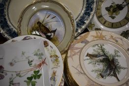 A collection of display plates including eight Royal Worcester 'Birds of America', Wedgwood and