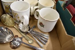 A quantity of coronation ware and a selection of desert spoons