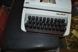 Two vintage typewriters including an electric Smith Corona Coronet Automatic 12 in carry case and