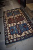 A traditional Kazak style rug, approx 180 x 112cm