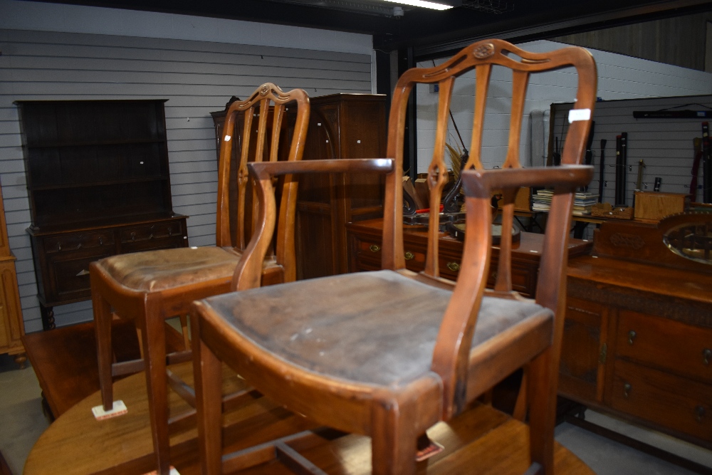 A set of five (three plus two) early 20th Century mahogany dining chairs