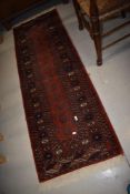 A traditional Persian carpet runner, 183 x 63cm