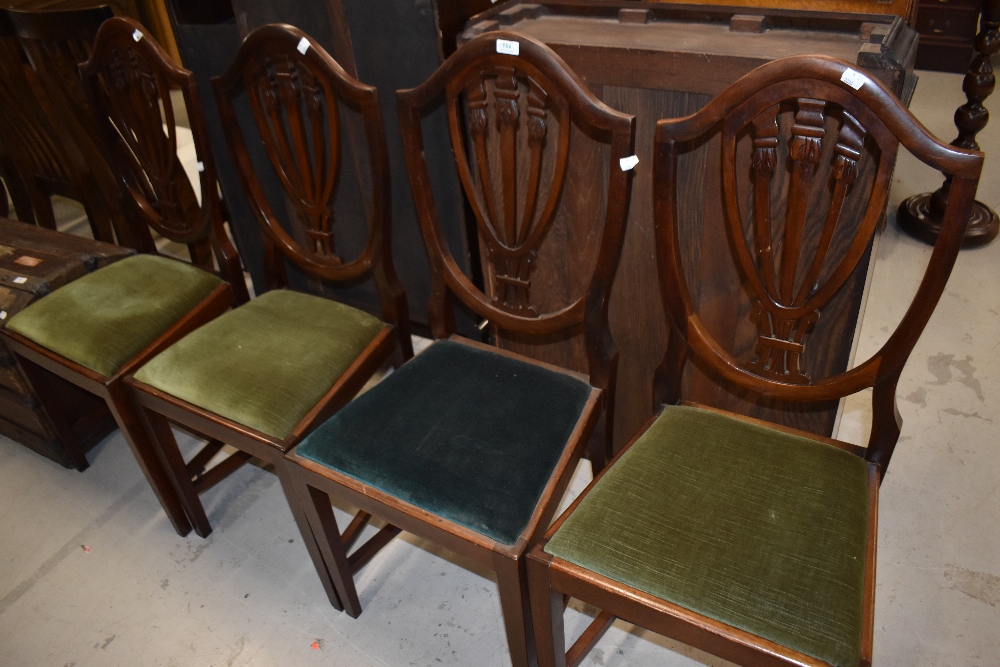 A set of four early 20th Cntury mahogany shield back dining chairs