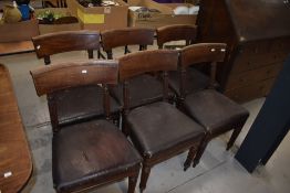 A set of six 19th Century rail back dining chairs having fluted frames and legs, nice design if a