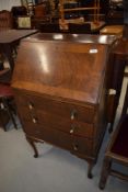 An early 20th Century walnut dwarf bureau