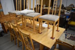 A modern Ikea extending dining table (norden) and set of ten (adam) siilar dining chairs