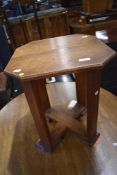 An Arts and Crafts style oak occasional table