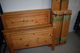 Two modern pine single bed frames