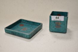 A vintage SWedish Gustavsberg Argenta cube formed pinch pot and saucer, in mottled teal finish