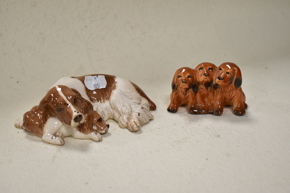 A Royal Doulton dog and puppy study, and A Beswick trio of dogs. - Image 2 of 3