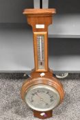 A mid century wall mounted barometer.