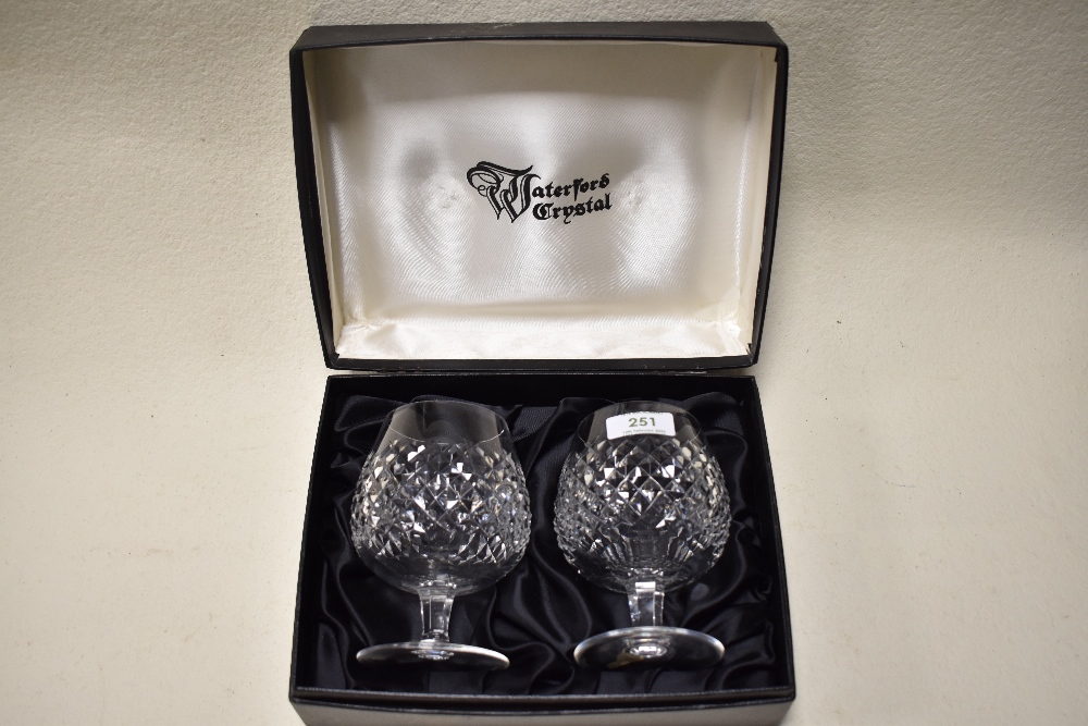 A pair of Waterford Crystal brandy glasses, in box, original stickers still present on foot of