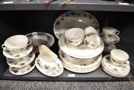 A part Royal Doulton 'Camelot' dinner service having autumnal toned leaf design on white ground,