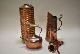 An early 20th century ribbed copper 'Kumfy' hot water bottle, a miniature copper kettle and horn and
