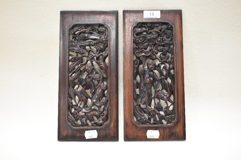 Two late 19th century Chinese/Cantonese finely carved decorative hardwood panels,possibly rosewood,