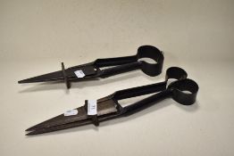 Two sets of antique sprung sheep shears, both signed, one illegible, the other reading Ward,