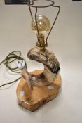 A rams horn and burr maple table lamp with oversized decorative bulb.