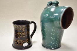 A Wetherigg pottery pint mug, reading '1880 mining 1880, British Gypsum, Kirkby, Thore' And a