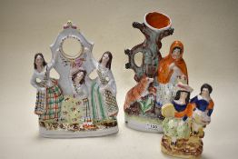 Three Staffordshire flat back figurines, to include little red riding hood and three ladies in