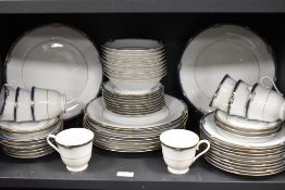 A collection of Noritake 'Impression' pattern partial dinner service, having white ground with