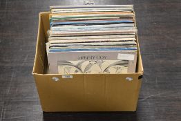 A mixed lot of vinyl LP records, including easy listening, rock and more.