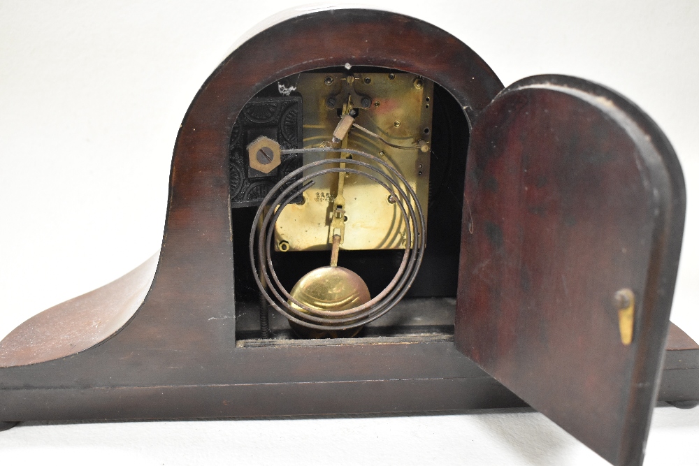 An early 20th century hump back mantel clock. - Image 3 of 3