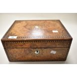 A late 19th century burr walnut box having geometric inlaid decoration, MOP escutcheon and