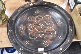 A middle Eastern turned wood tray having inlaid MOP decoration.