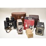 A mixed lot of vintage items, to include Model D box Brownie camera, Bell and Howell Cine camera and