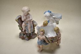Three 20th century ceramics, to include double stemmed bud vase with cherub child playing