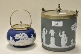 An early 20th century Wedgwood Jasperware biscuit barrel in sage green having typical classical