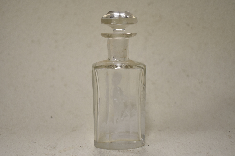 A 20th century clear glass perfume bottle having faceted stopper and white enamel decoration in - Image 2 of 2