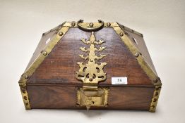 A 19th century Indian mahogany wedding box/ jewellery box having brass brackets, handle and lock.