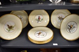Nine circa 1870s-90s Mintons plates, having hand painted with various bird designs to centres of